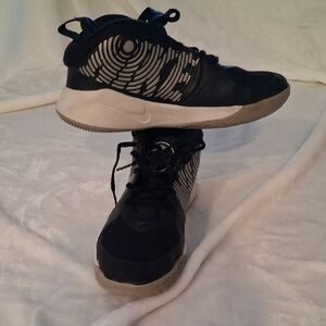 Boys Nike Black and White Athletic Performance Shoes.